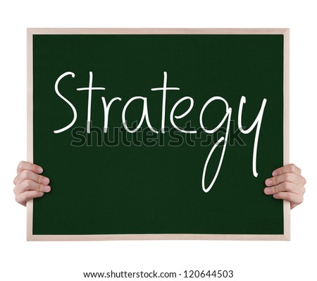 strategy on blackboard with hands