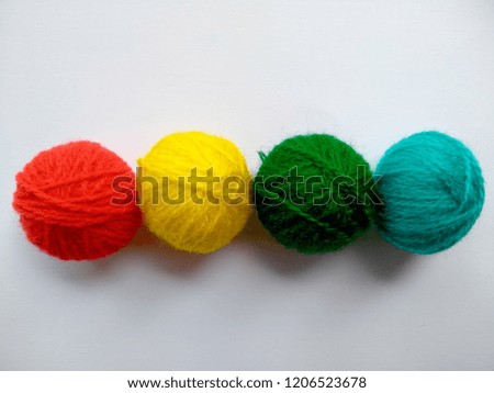 Background of wool yarn, knitted yarn, can also be used as a yarn frame. Knitting yarn for handicrafts isolated on white background.