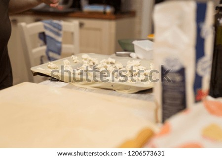 horizontal image of focaccia preparation with cheese

