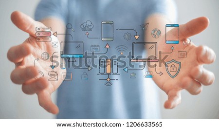 Businessman on blurred background using tech devices and icons thin line interface