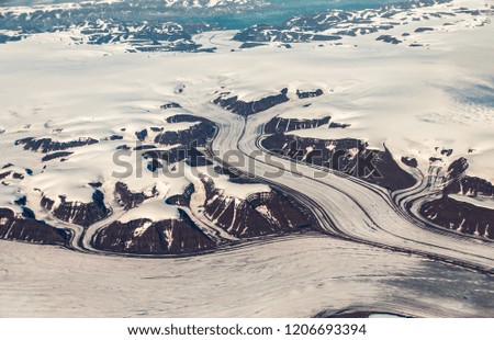Greenland View on Airplane,Frozen Mountains Above,Glaciers Greenland
top view greenland, 