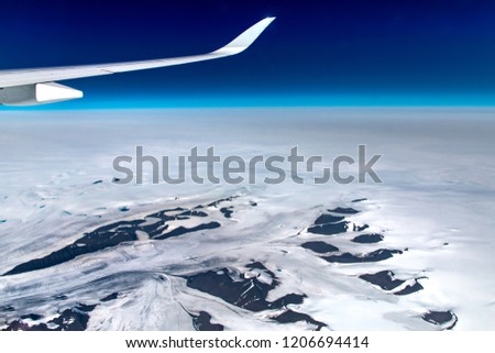 Greenland View on Airplane,Frozen Mountains Above,Glaciers Greenland
top view greenland, 