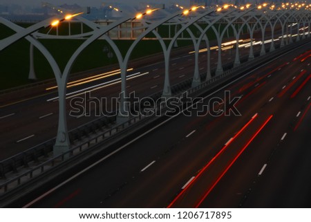 highway photographed at night with a slow shutter speed