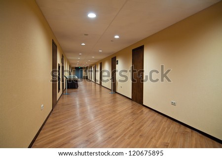 Empty hotel hallway Royalty-Free Stock Photo #120675895