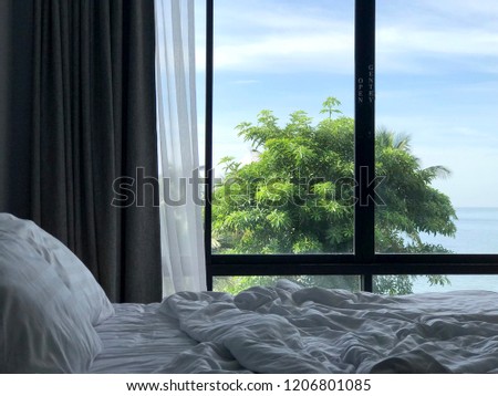 Morning beach view from bed room hotel. Vacation holidays background Royalty-Free Stock Photo #1206801085