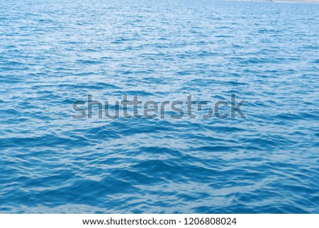 Beautiful blue and turquoise color of the calm sea for nature and bright background
