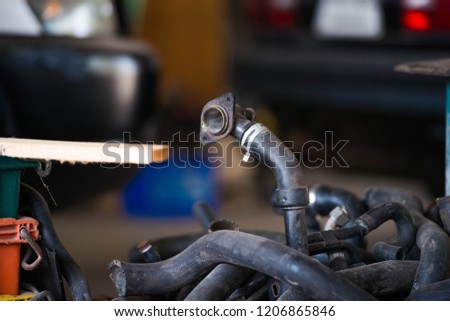 car service centre with auto at repair station bokeh light defocused blur background