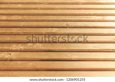 Wooden background of orange color. Light texture cant