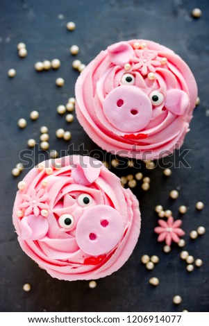 Miss piggy cupcakes - beautiful and delicious cakes decorated with pink cream shaped funny piggy faces, christmas and new year 2019 themed treat for kids party
