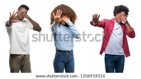 Collage of african american group of people over isolated background covering eyes with hands and doing stop gesture with sad and fear expression. Embarrassed and negative concept.