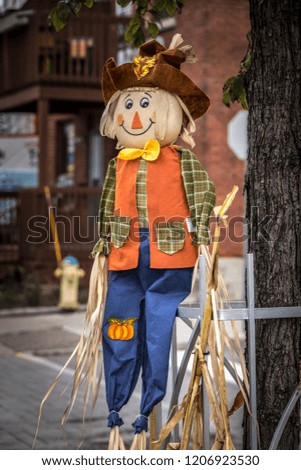 Happy smiling Halloween scarecrow puppet decorations.