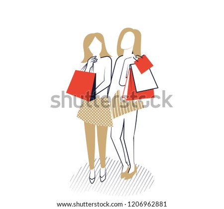 Young girls with shopping bags.