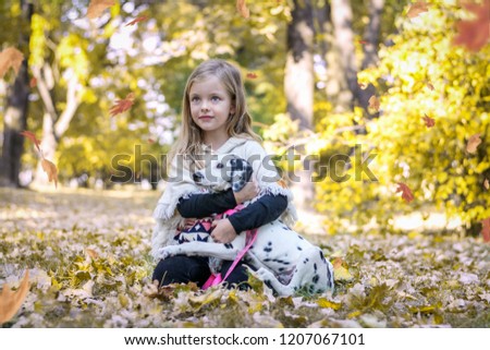 The girl with a dog in the park