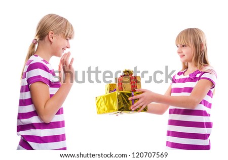 Christmas/Birthday gift -Girl giving gifts to another girl isolated on white background