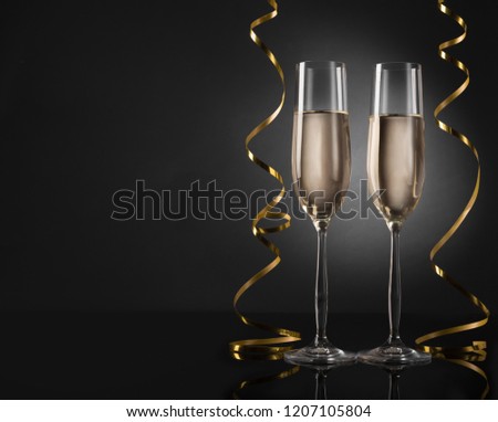 Minimalistic background with champagne glasses, copy space