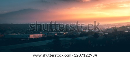 A panorama of Sheffield city at sunset Royalty-Free Stock Photo #1207122934