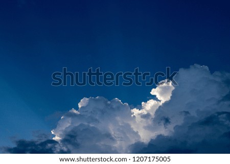 Blue sky with clouds background. Beautiful white fluffy clouds on a light blue sky background. Clearing day and Good weather in the morning.It's a beautiful picture. It was taken in the morning.
