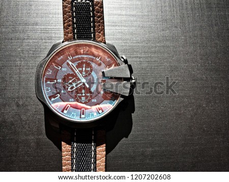 wrist watch with leather strap on a dark background, watch on a dark background, dial, clock hands, wrist watches
