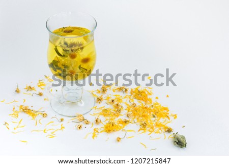 Herbal medicinal natural tea with chamomile, mint and calendula flowers.