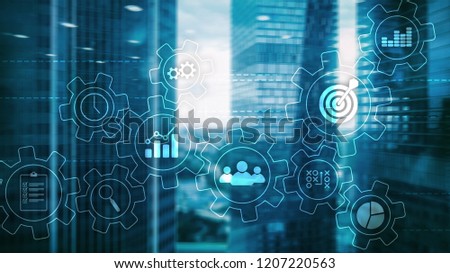 Business process automation concept. Gears and icons on abstract background. Royalty-Free Stock Photo #1207220563