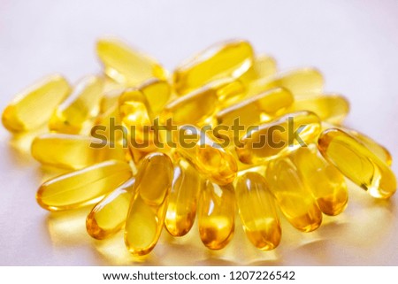 Close up of capsules Omega 3 on white background. Copy space for your text. Top view, high resolution product. Health care concept