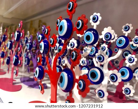 Different types of decorative evil eye beads.