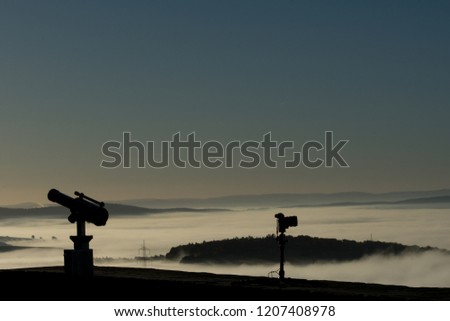 Inversion weather condition at the german lake Edersee with telescope and digital camera
