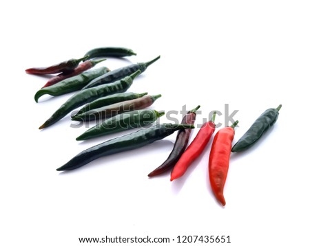 Closeup view of green/red chili pepper on white background, raw food ingredient concept