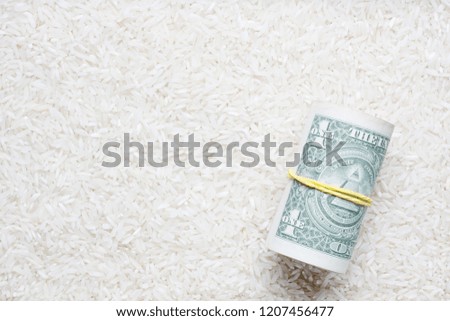 Dollars with rice background
