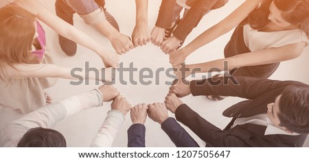 Multicultural hands synergy brainstorm business man woman in circle top view background. Support helping teamwork together international diversity harmony education and people concept panoramic banner Royalty-Free Stock Photo #1207505647