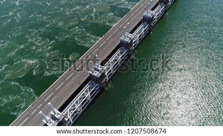 Aerial bird view picture of Eastern Scheldt storm surge barrier in dutch Oosterscheldekering is largest of Delta Works series of dams and barriers designed to protect Netherlands from flooding