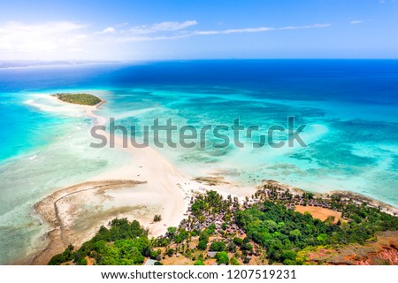 Aerial view of Nosy Iranja with a turquoise sea and white sand, north of nosy be, a beautiful island in madascar, africa Royalty-Free Stock Photo #1207519231