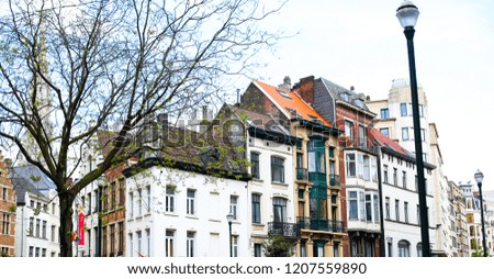 Banner of Belgian buildings and street lantern. Concept of european architecture and cheap tours to Europe.