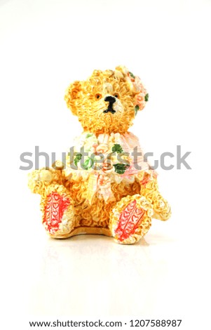 teddy bear statue isolated on white background