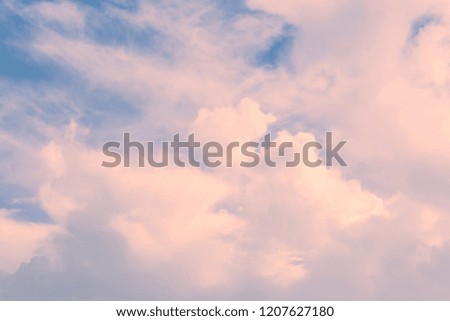View of the clouds through a light filter. Background. Abstraction. Texture. Azure, blue, pink