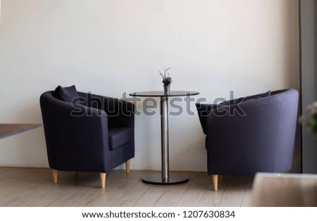 Decorated in a coffee shop or restaurant. Furniture with an empty photo frame in the shop.