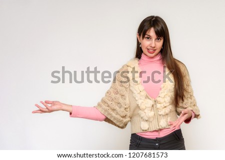 Studio photo of a beautiful brunette girl on a white background with different emotions. She is standing right in front of the camera in various poses, smiling and looking happy.