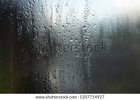 Water mist in the morning glass