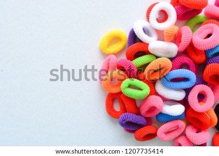 Multi colored ladies hair elastic bands isolated on the white background