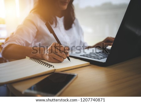 young woman  with learning language during online courses using netbook Royalty-Free Stock Photo #1207740871