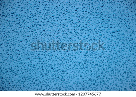 Rainy stains on a blue background.