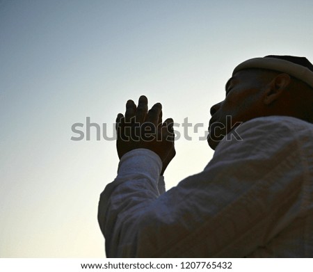 Muslim man praying stock photo