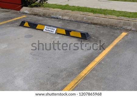 Carpark Parking bay with stop bumper 