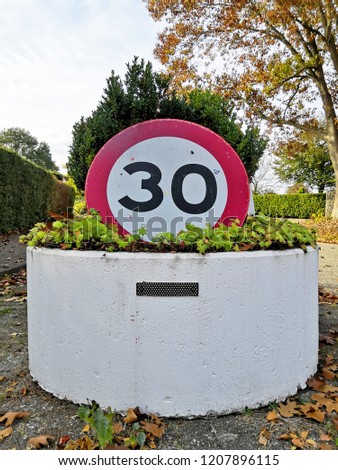 German speed limit sign on a pot