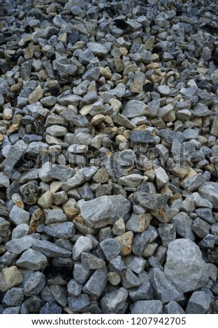 a lot of little stones on mountain slope interesting view concept