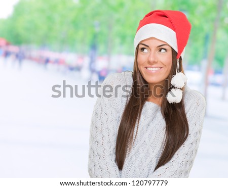 Happy christmas woman looking up, outdoor