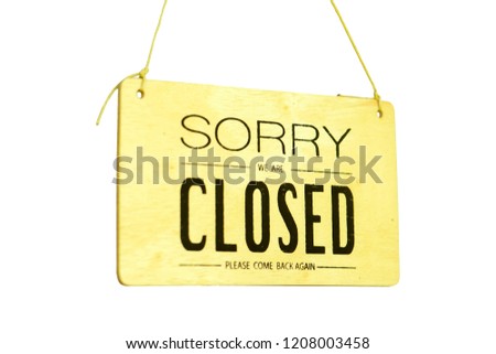 Sorry we're closed on wood hanging sign isolated on white.
