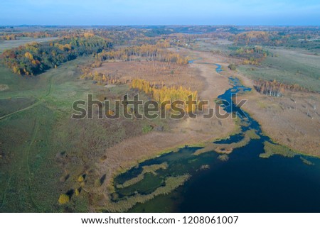 View of the Izborsko-Malsky valley in the Indian summer. Pskov region, Russia