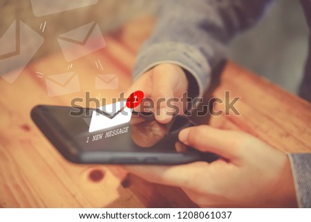 Woman hand using smartphone got 1 new message email. Business communication  technology concept.