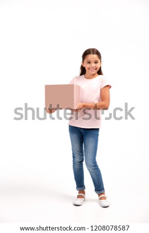 little girl with box isolated over white background